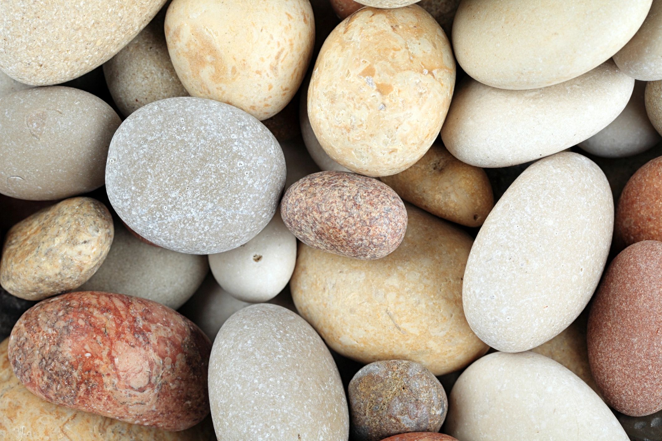 Mixed small pebbles close-up