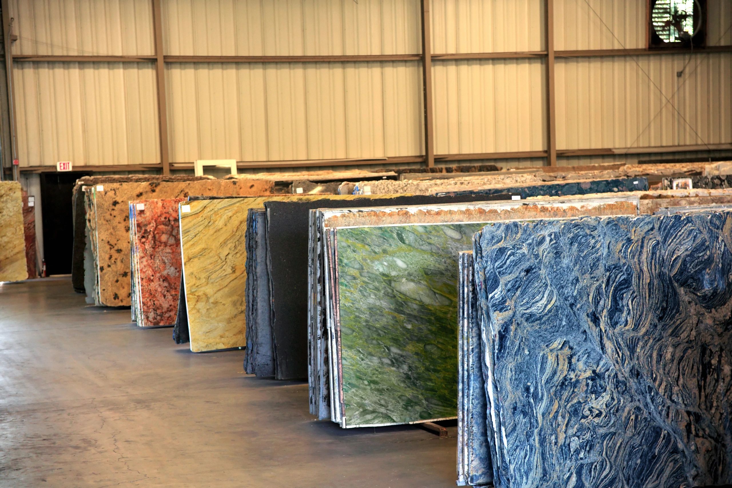 Row of granite slabs showing natural grain and color variation