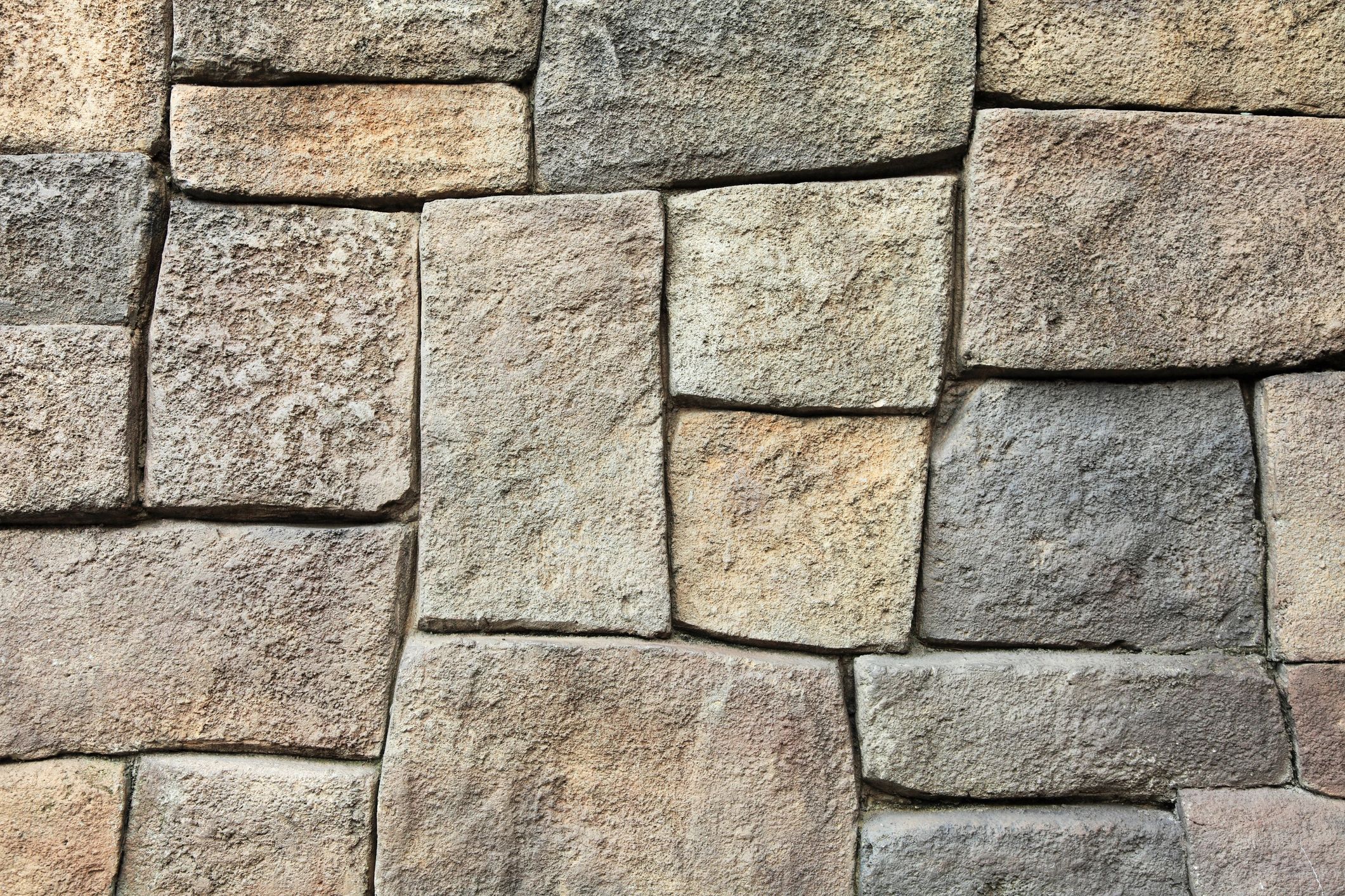 Stacked rough stones with varied colors and textures