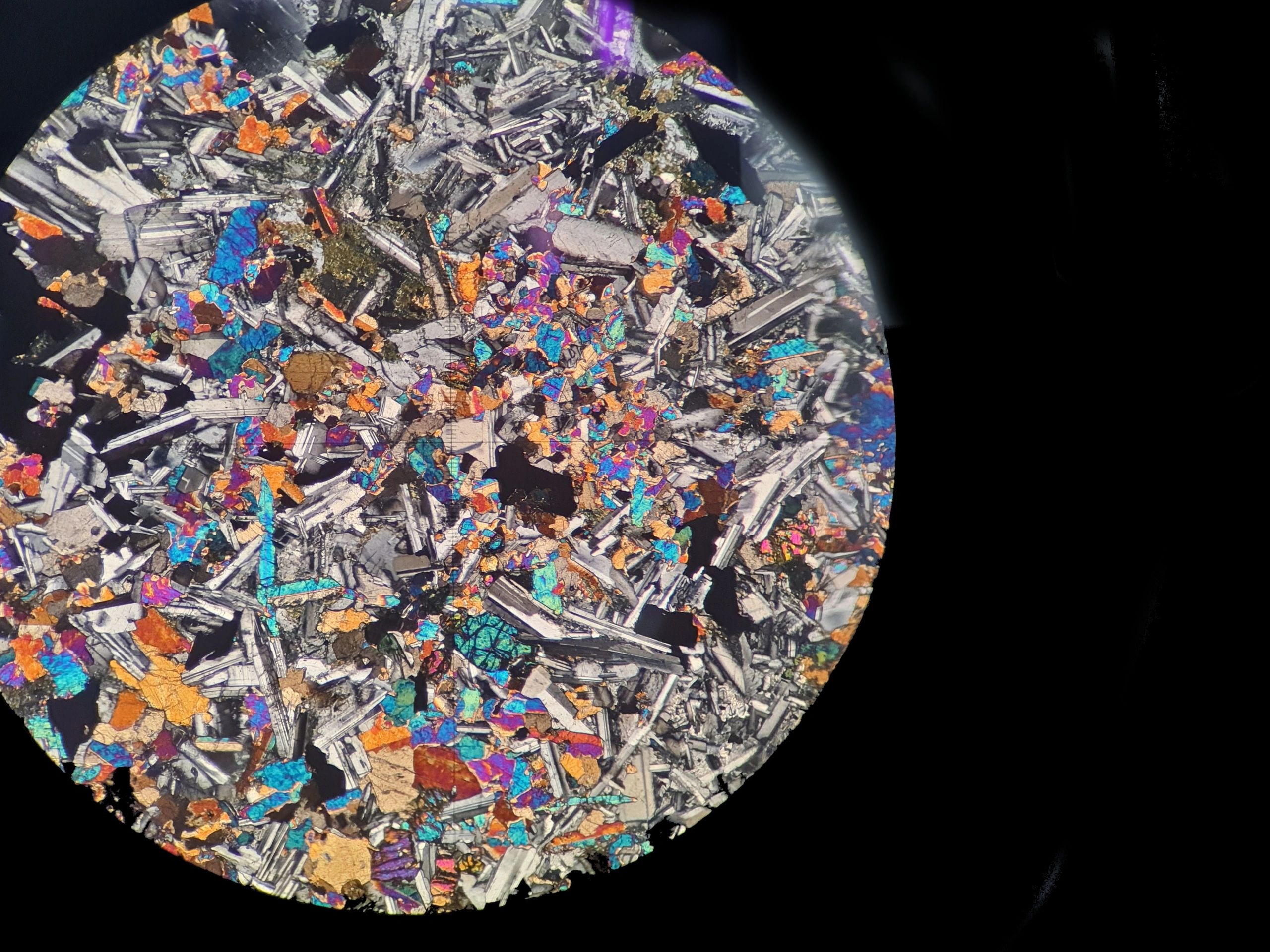 Epidote micrograph on petrographic slide