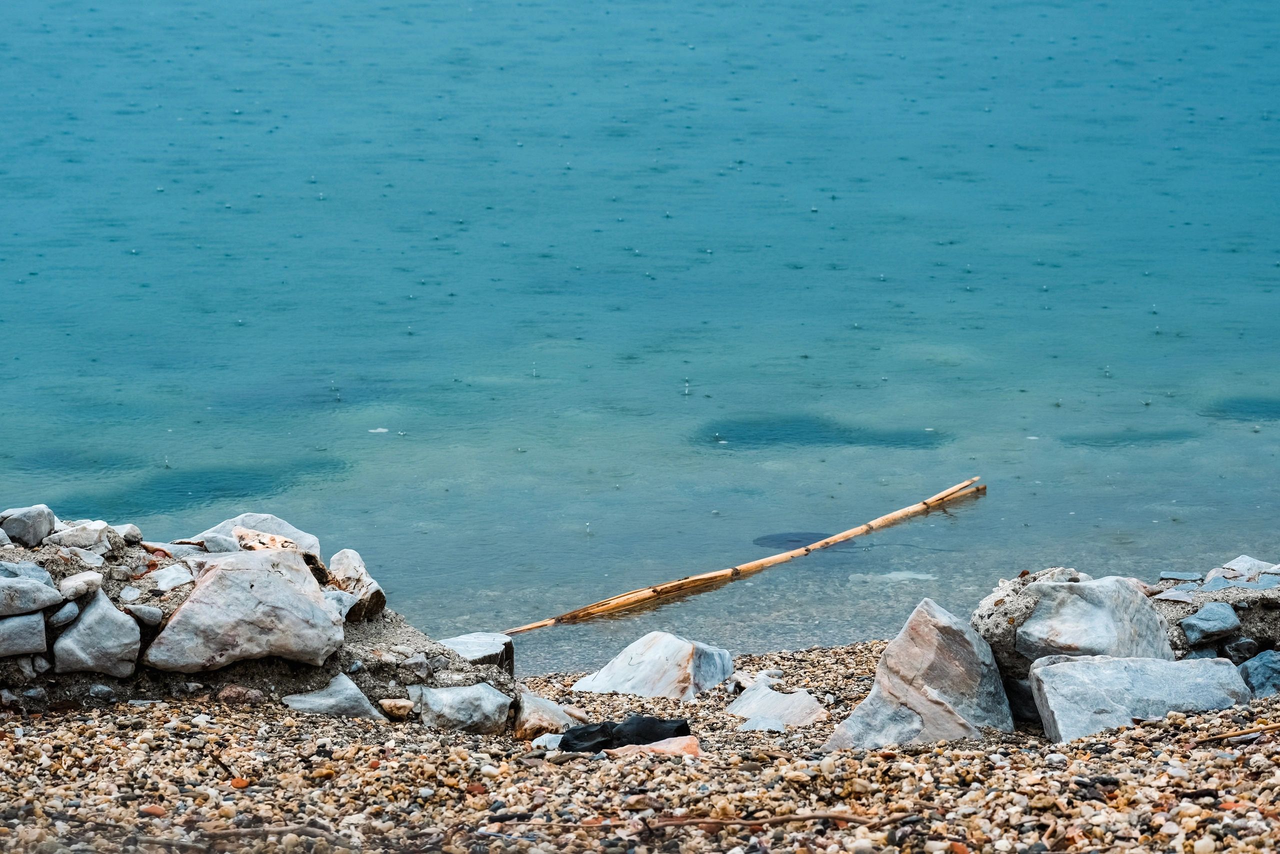 Rocky shoreline with turquoise water
