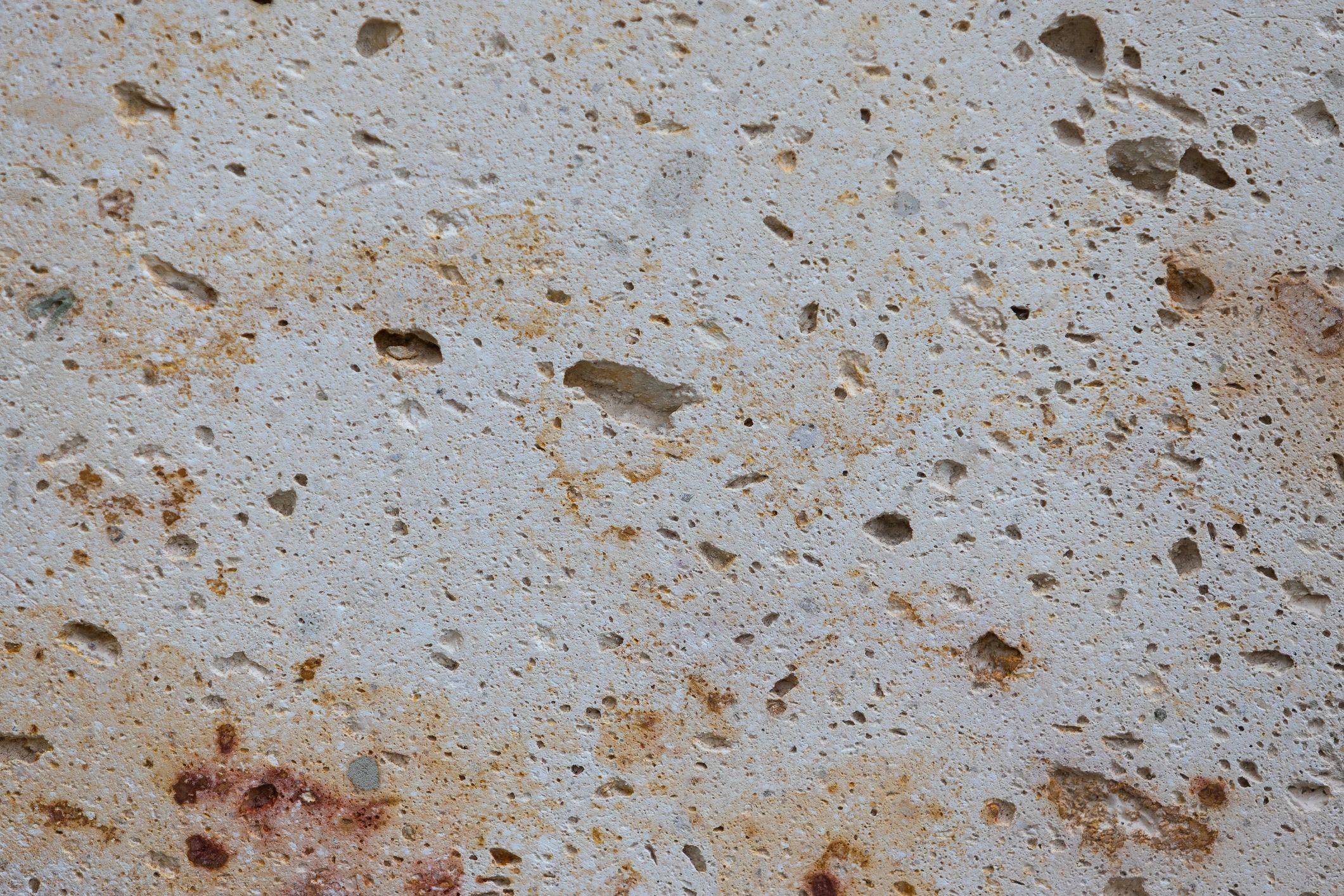 Light volcanic tufa or limestone texture suitable for a background