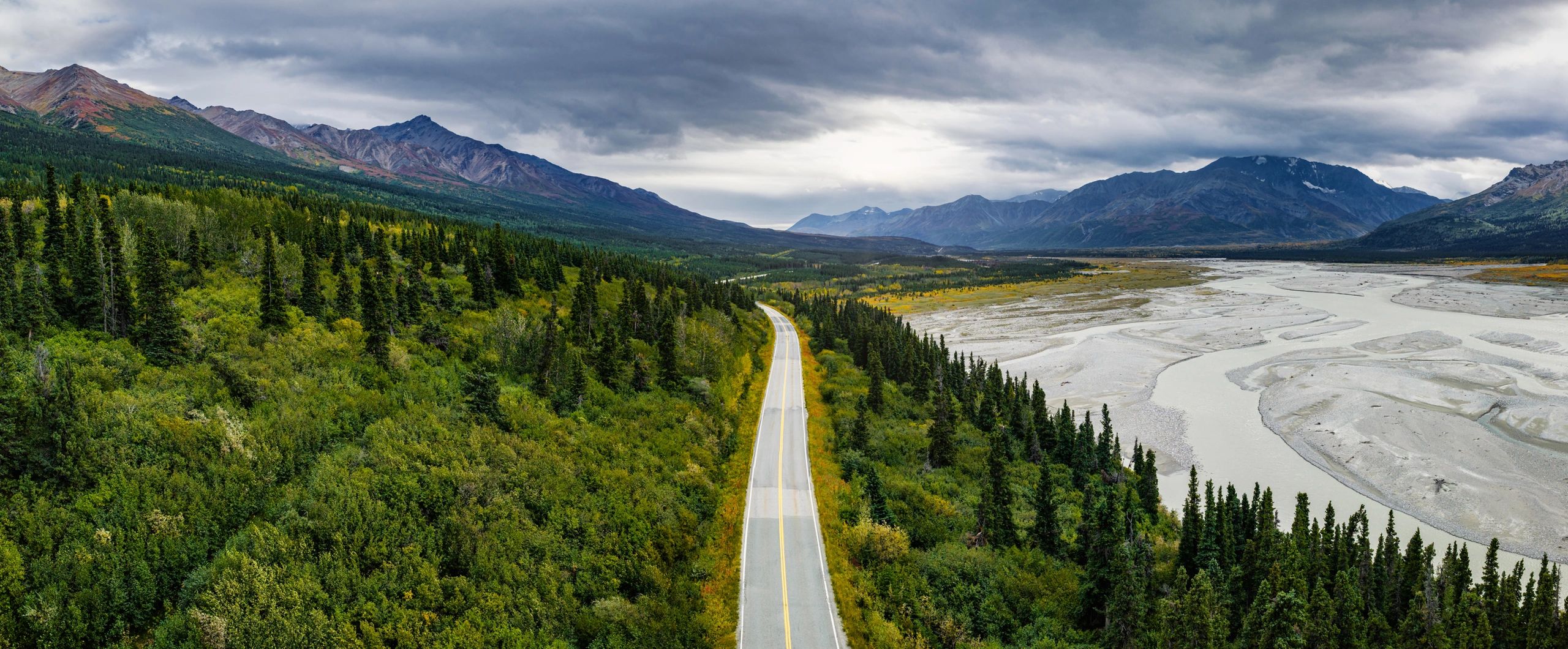 Aerial view of Alaska Range mountains and braided glacial river valley