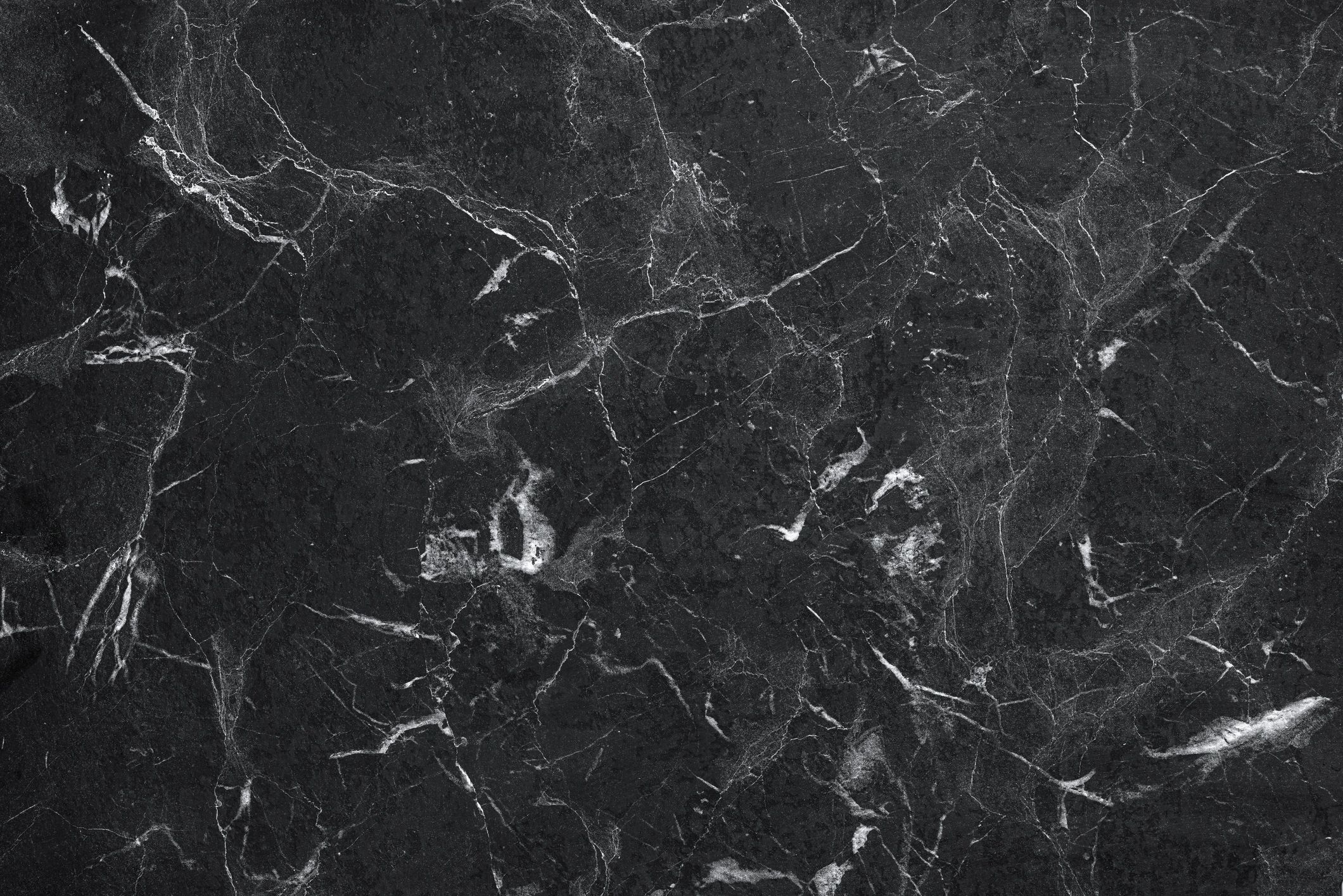 Dark natural stone slab texture representing natural stones