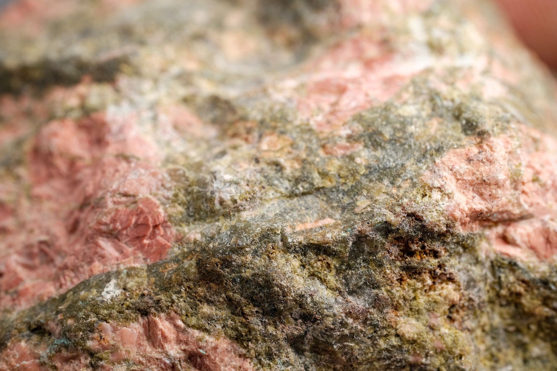 Pink and gray mineral rock macro