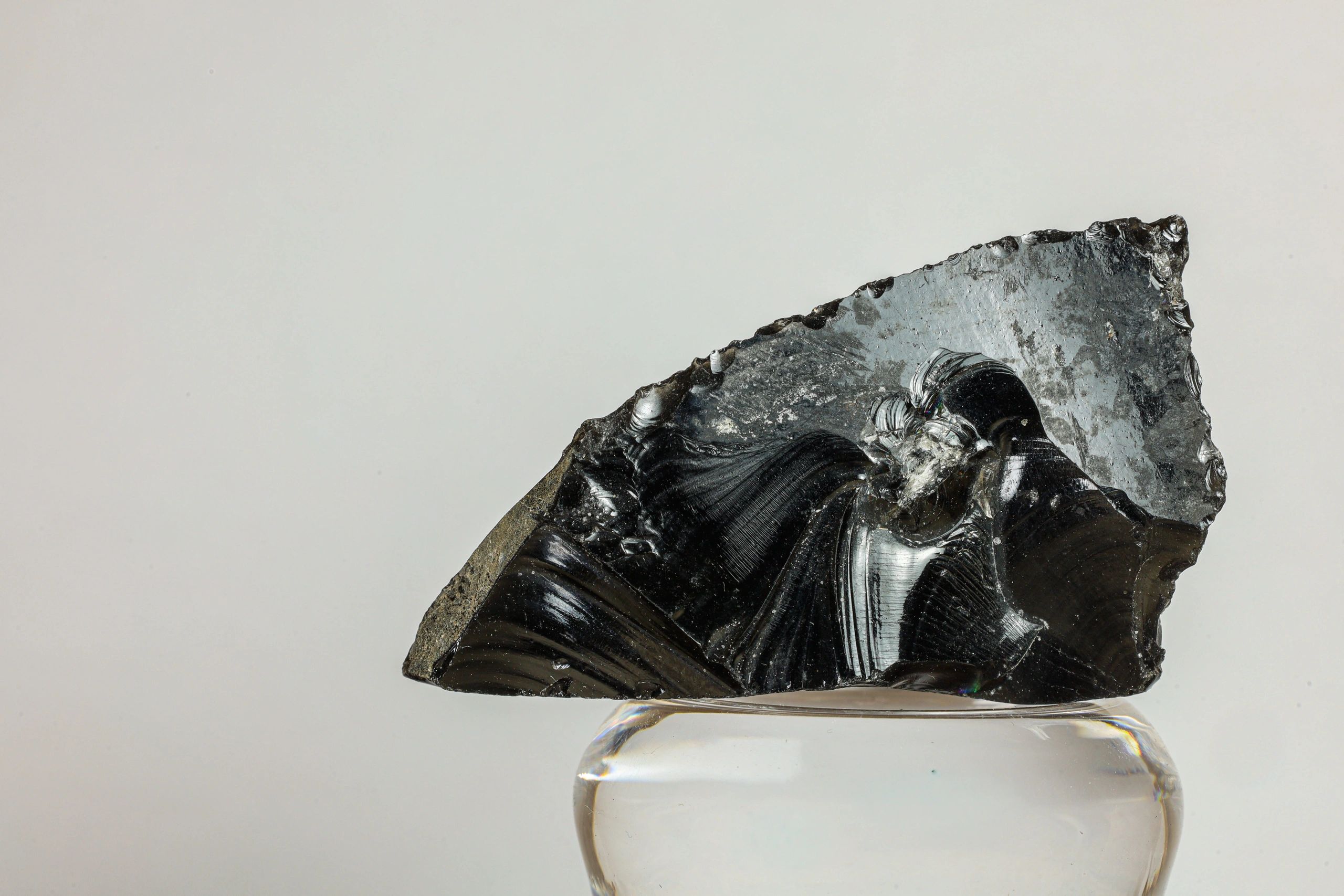 Raw black obsidian specimen