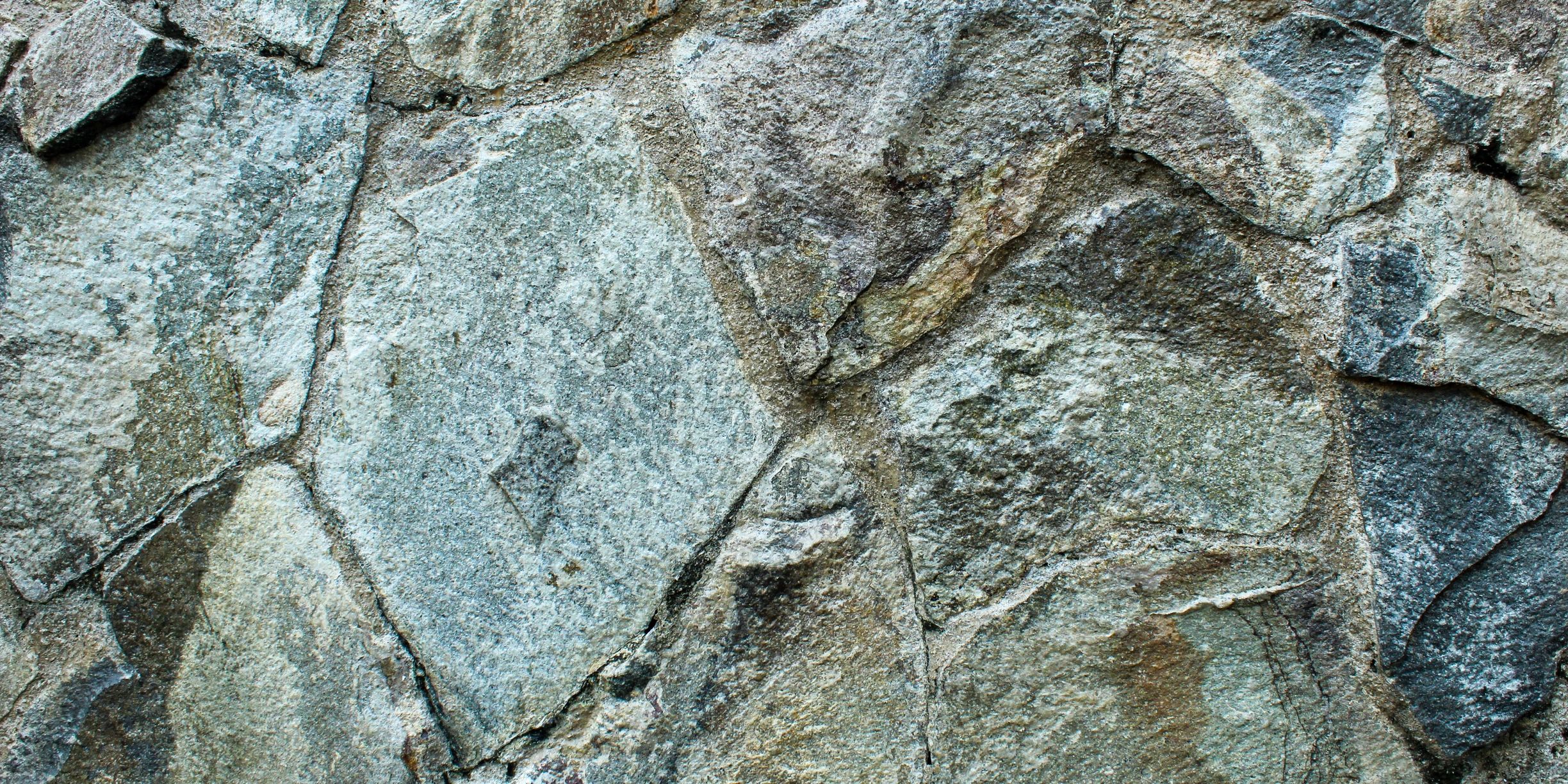 Rough stone wall texture representing masonry and built structures