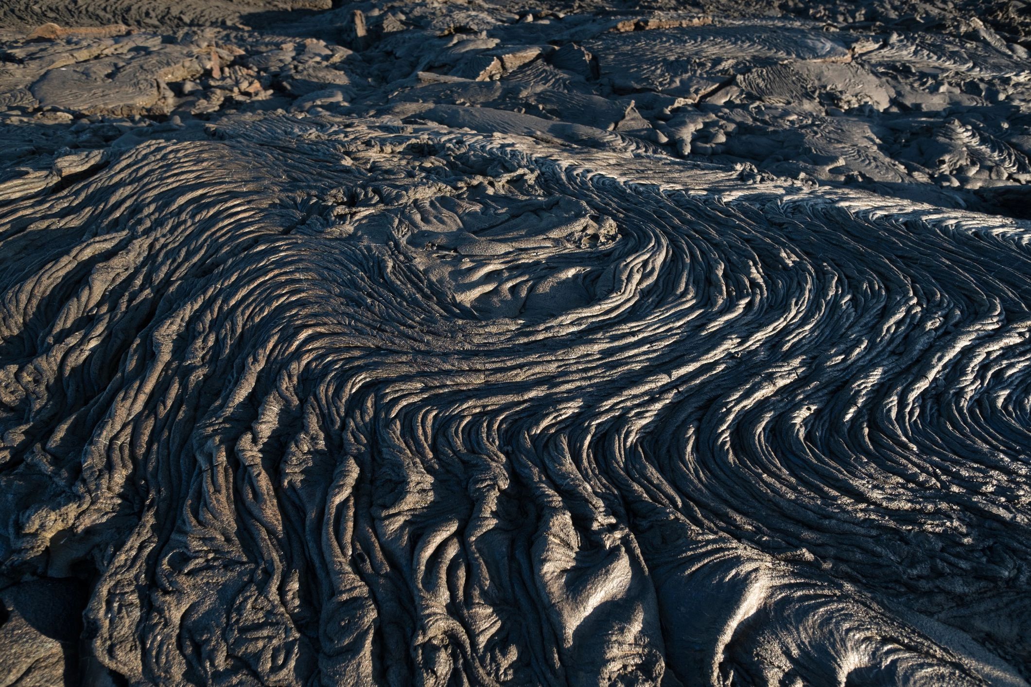 Dark lava field surface texture