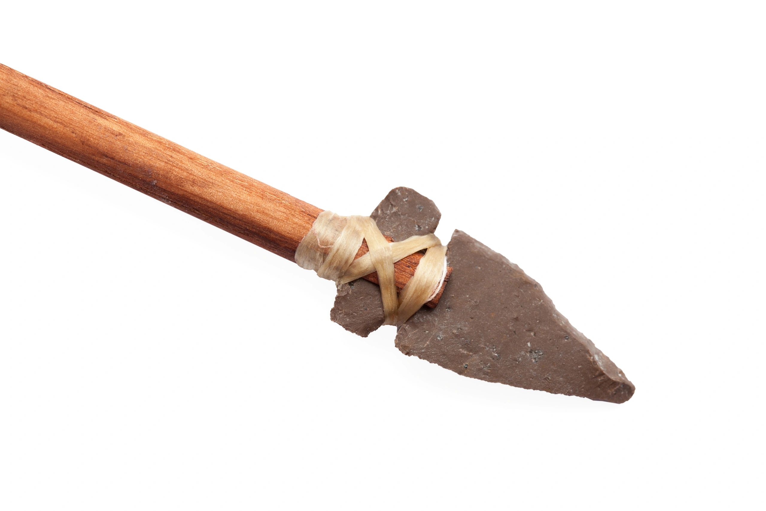 Handmade arrowhead isolated on white background